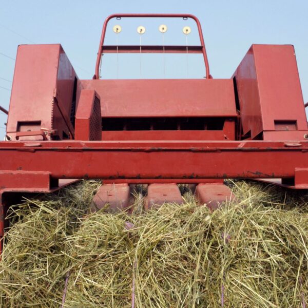 The front of a red baler
