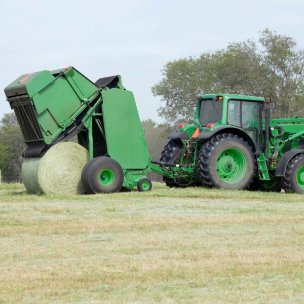 tractor baling hay