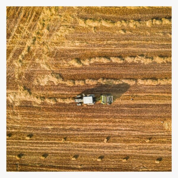 Hay baler at work in a field