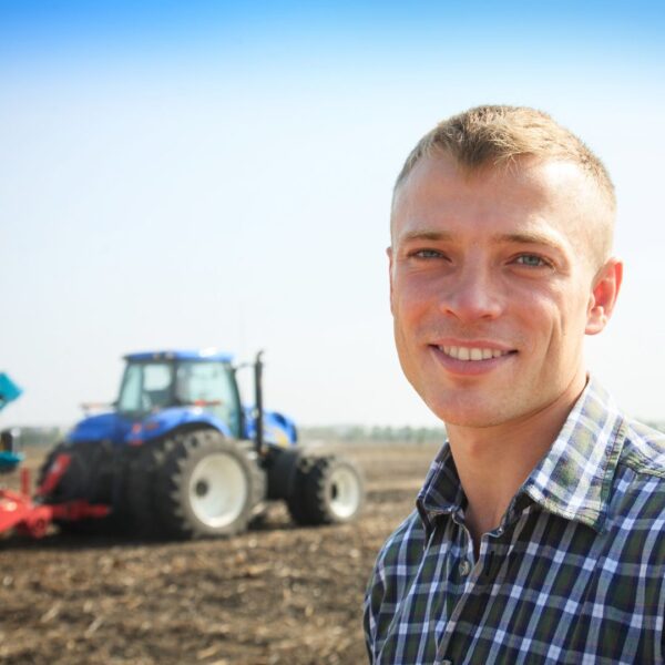 farmer smiling in field