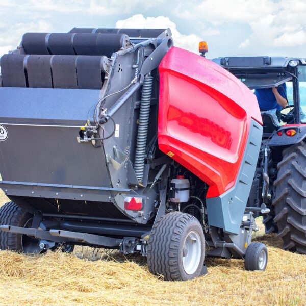 clean baler working in field