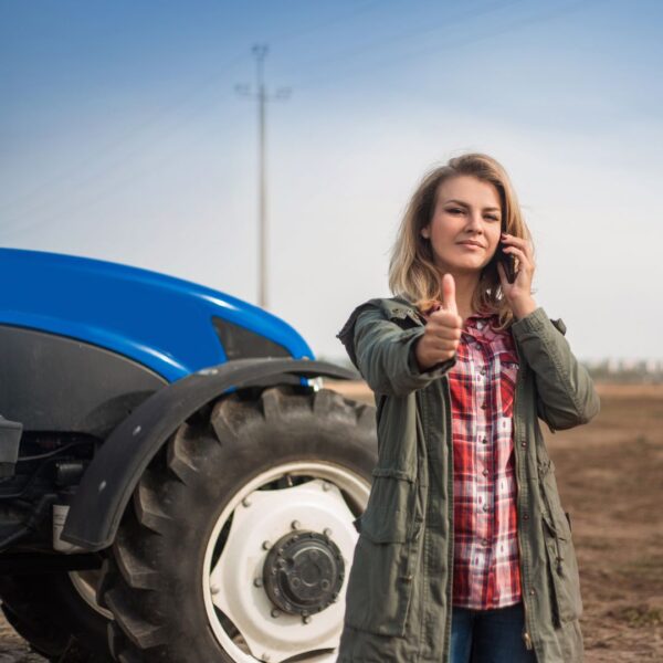 female farmer on phone in field